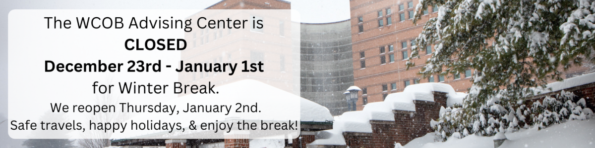 Snow on Peacock Hall with text overlay: Closed for Winter Break 12/23-1/1